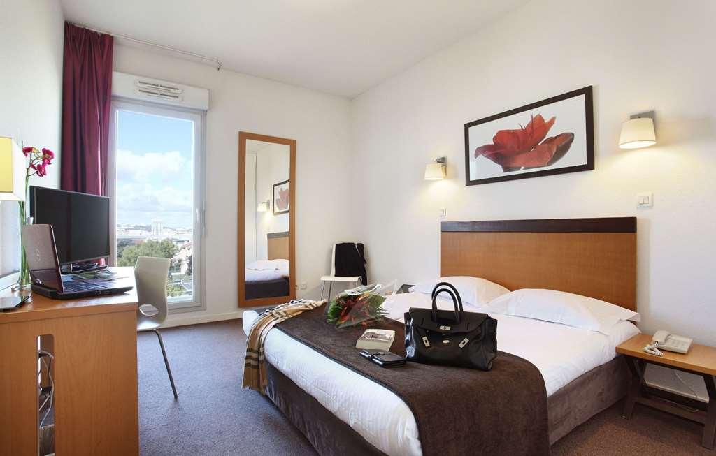 Appart'Hotel Odalys City - Bioparc Lyon Est Habitación foto