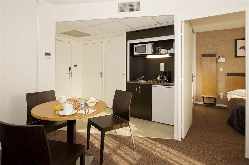 Appart'Hotel Odalys City - Bioparc Lyon Est Habitación foto